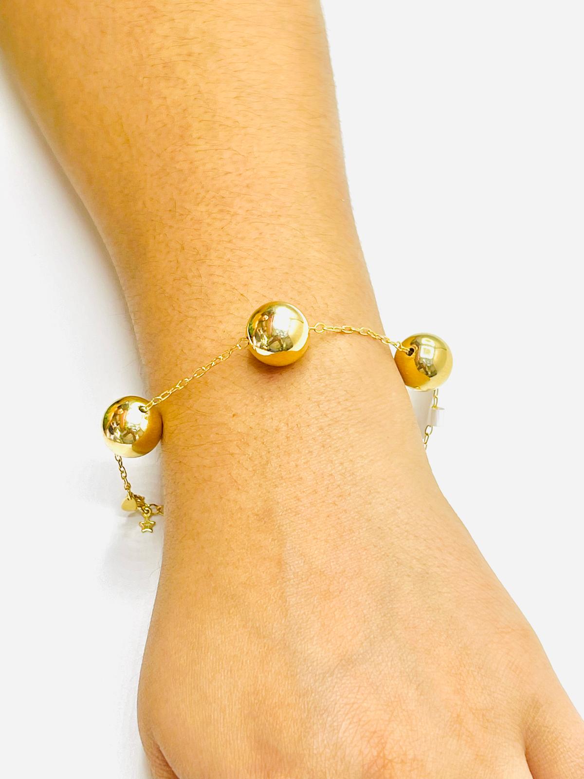 Large gold ball bracelet